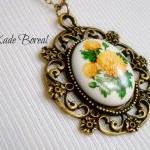 Price Reduced! Porcelain Marigold Flower Pendant..